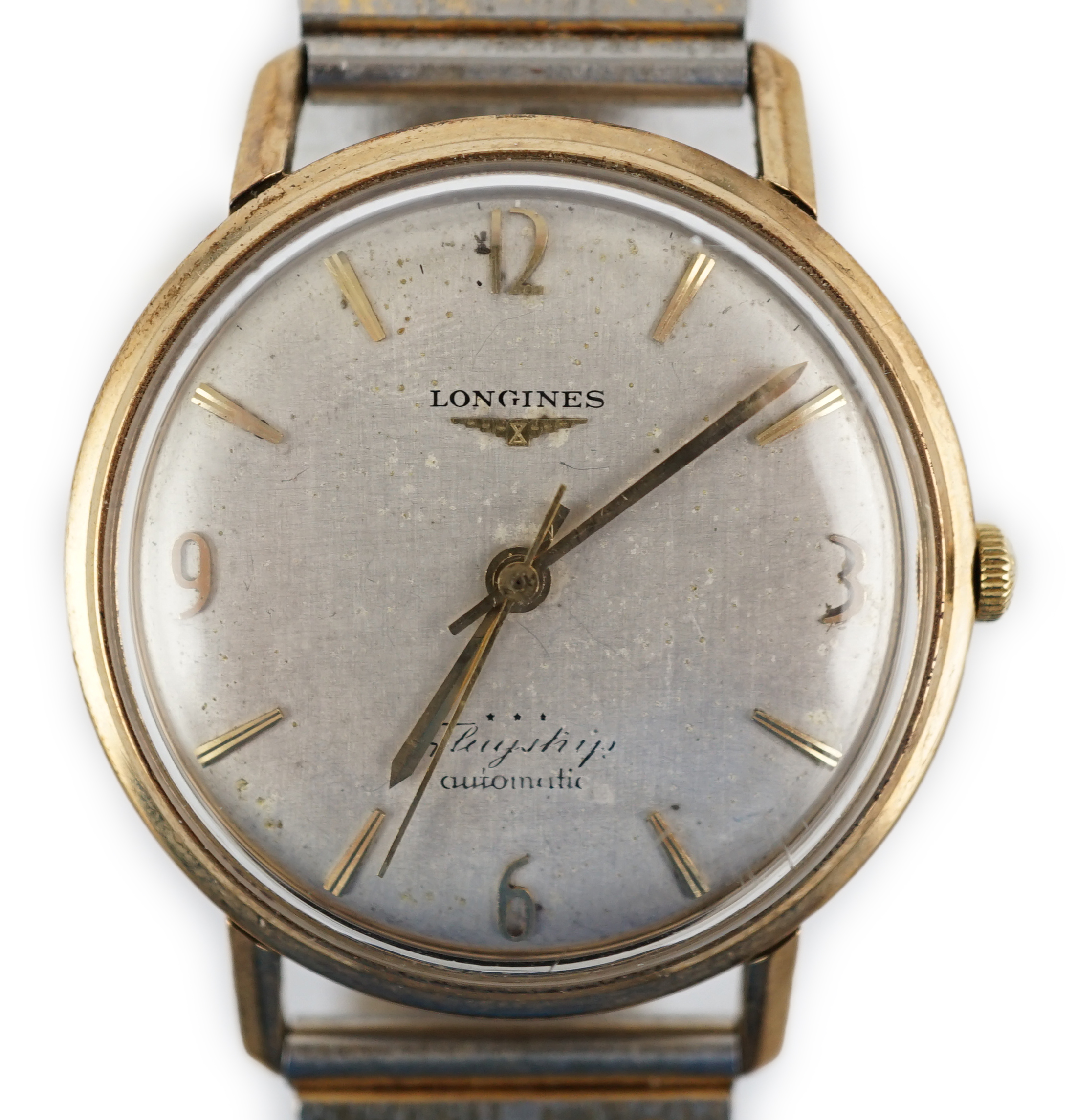 A gentleman’s 9ct gold Longines Flagship Automatic wrist watch, on associated metal bracelet, case diameter 35mm. Condition - poor to fair